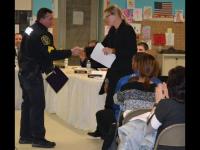 Sgt. Vostinak receiving an award for work on Naugatuck Schools Security